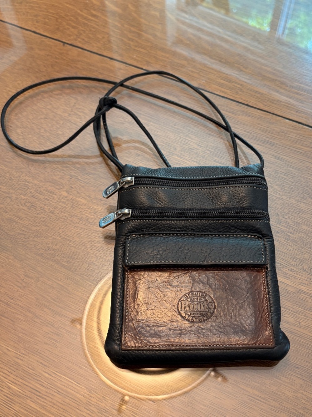 Roots Black and Brown Pebbled Leather Unisex Mini Crossbody Bag
